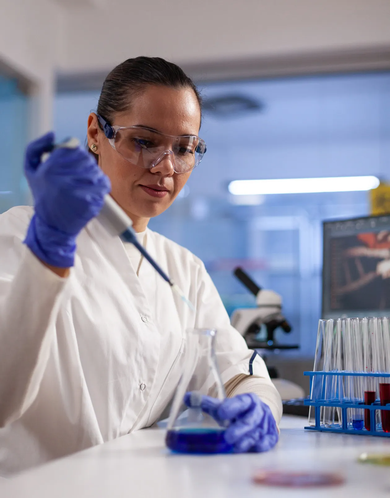 Scientist with dropper